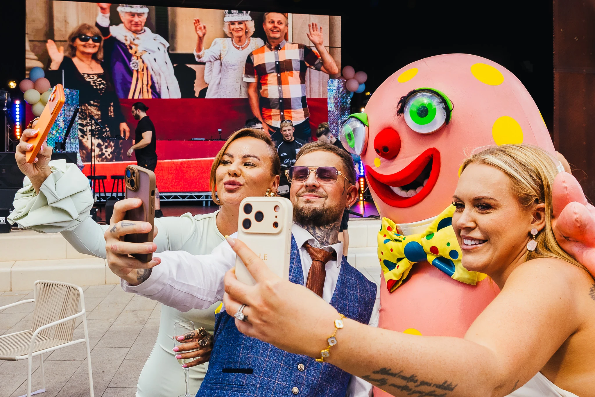 Couple taking a selfie with Mr Blobby at Binks Yard