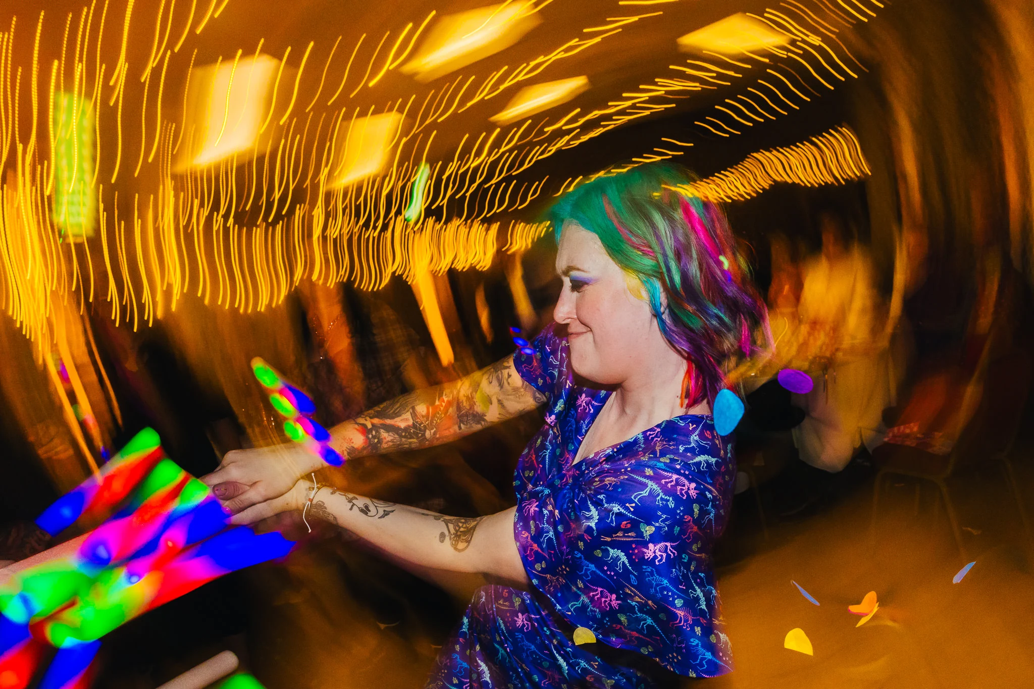 Guest dancing with glow sticks