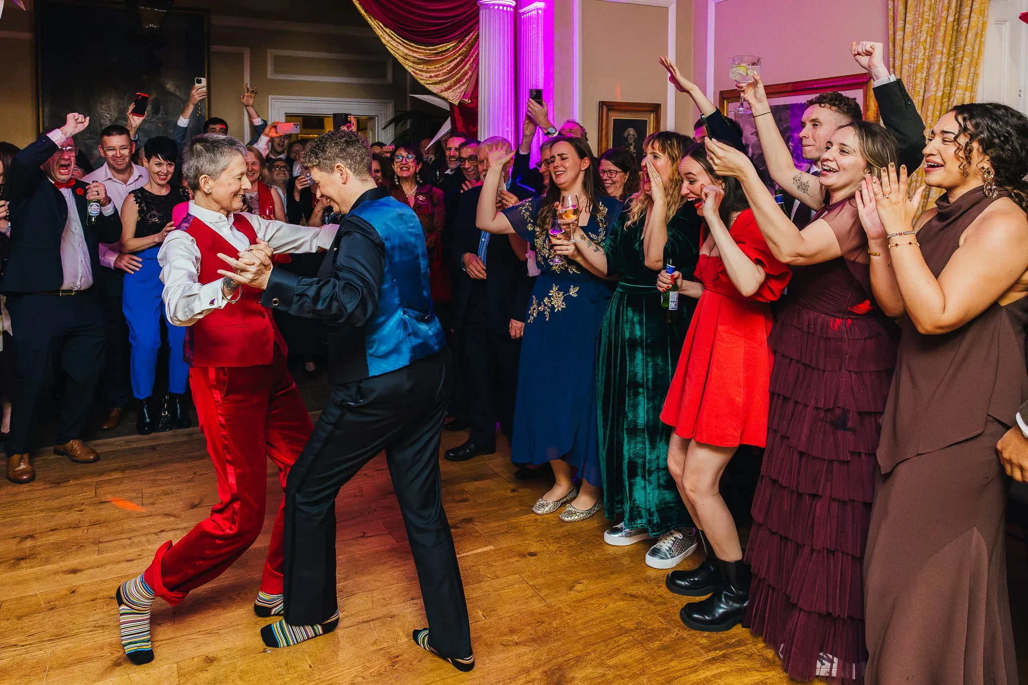 Couple and guests on the dance floor at Langar Hall