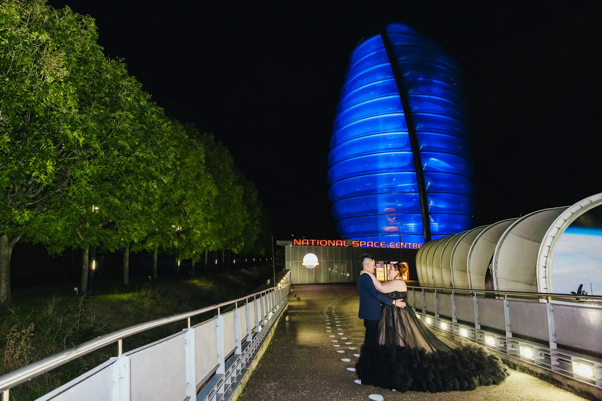 The National Space Centre lit up blue at night