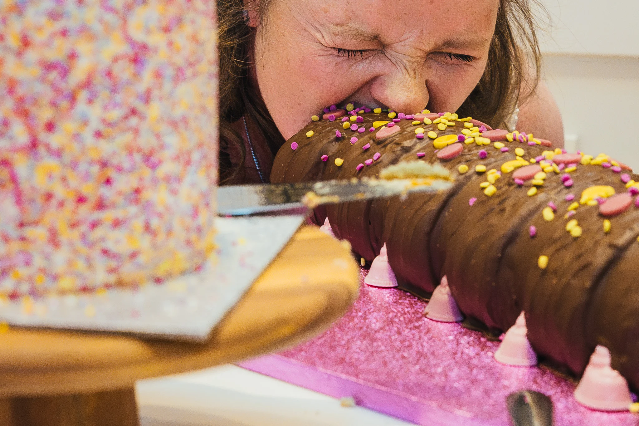 Guest taking a huge bite of wedding cake